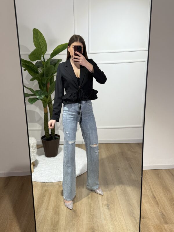 Jeans strappato brillantinato